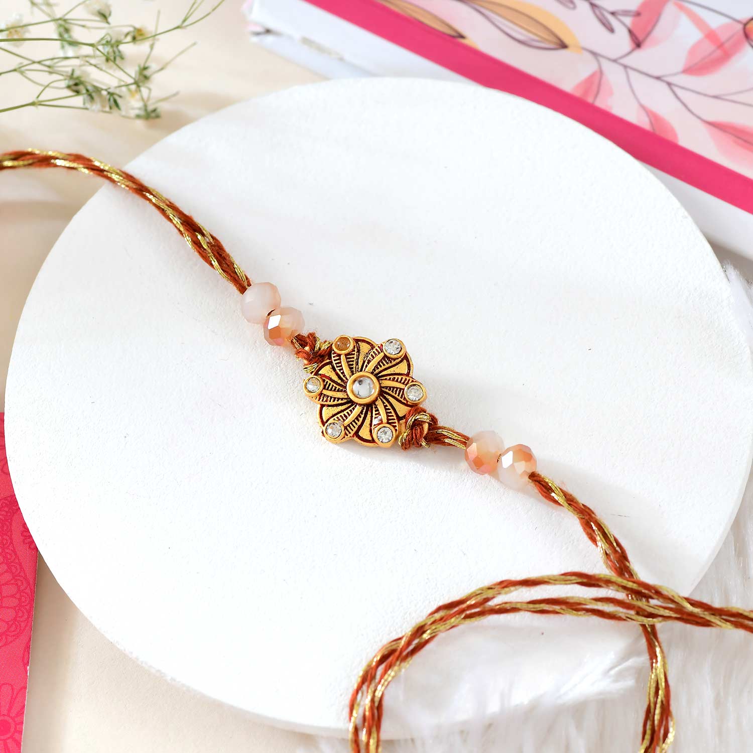 Golden Lotus Flower Rakhi With Dry Fruits