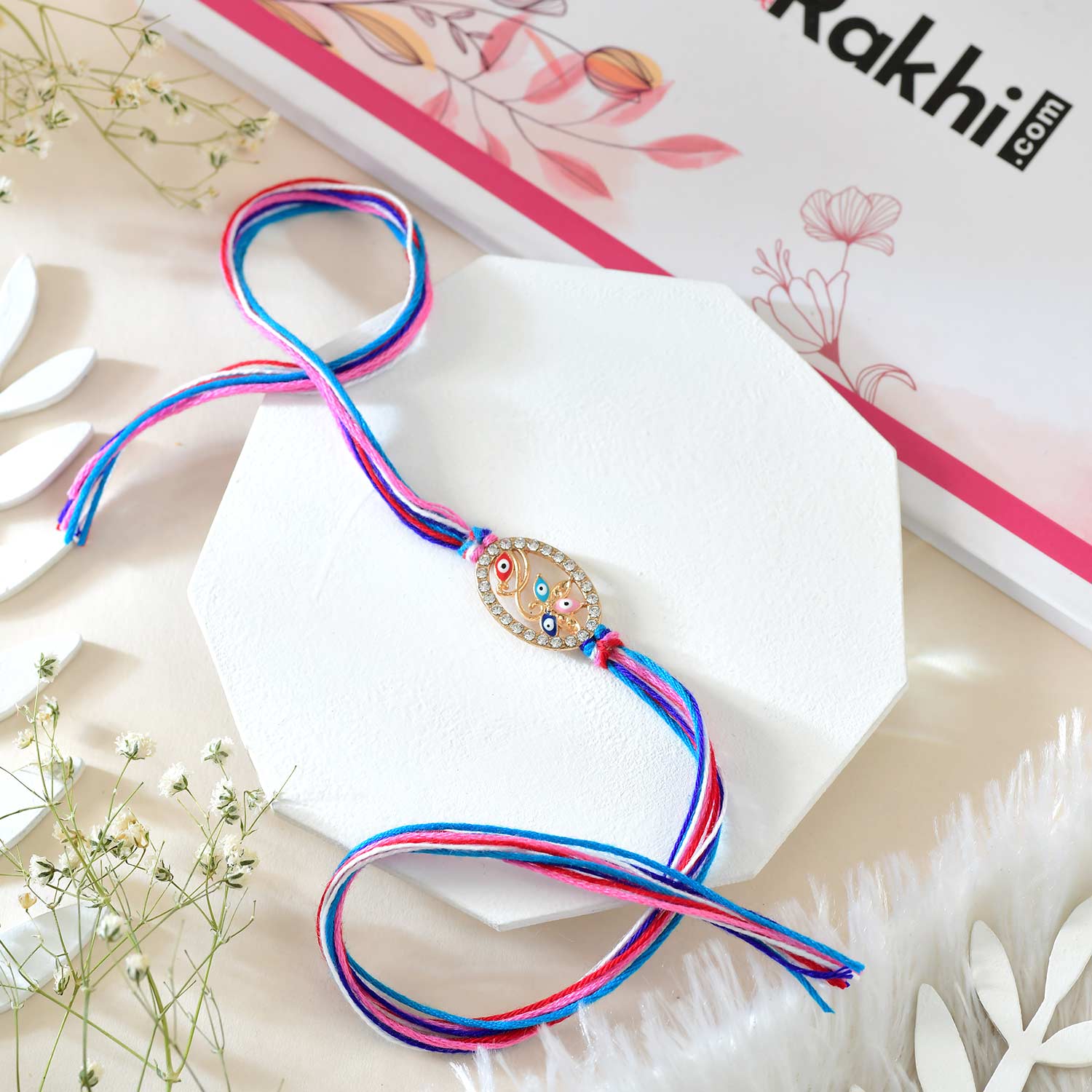 Designer Evil Eye Flower Rakhi With Kaju Katli