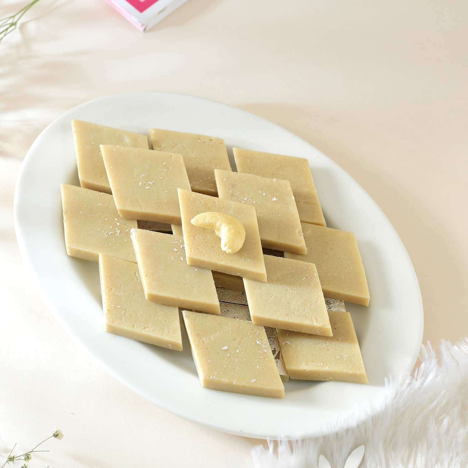 Designer Evil Eye Flower Rakhi With Kaju Katli