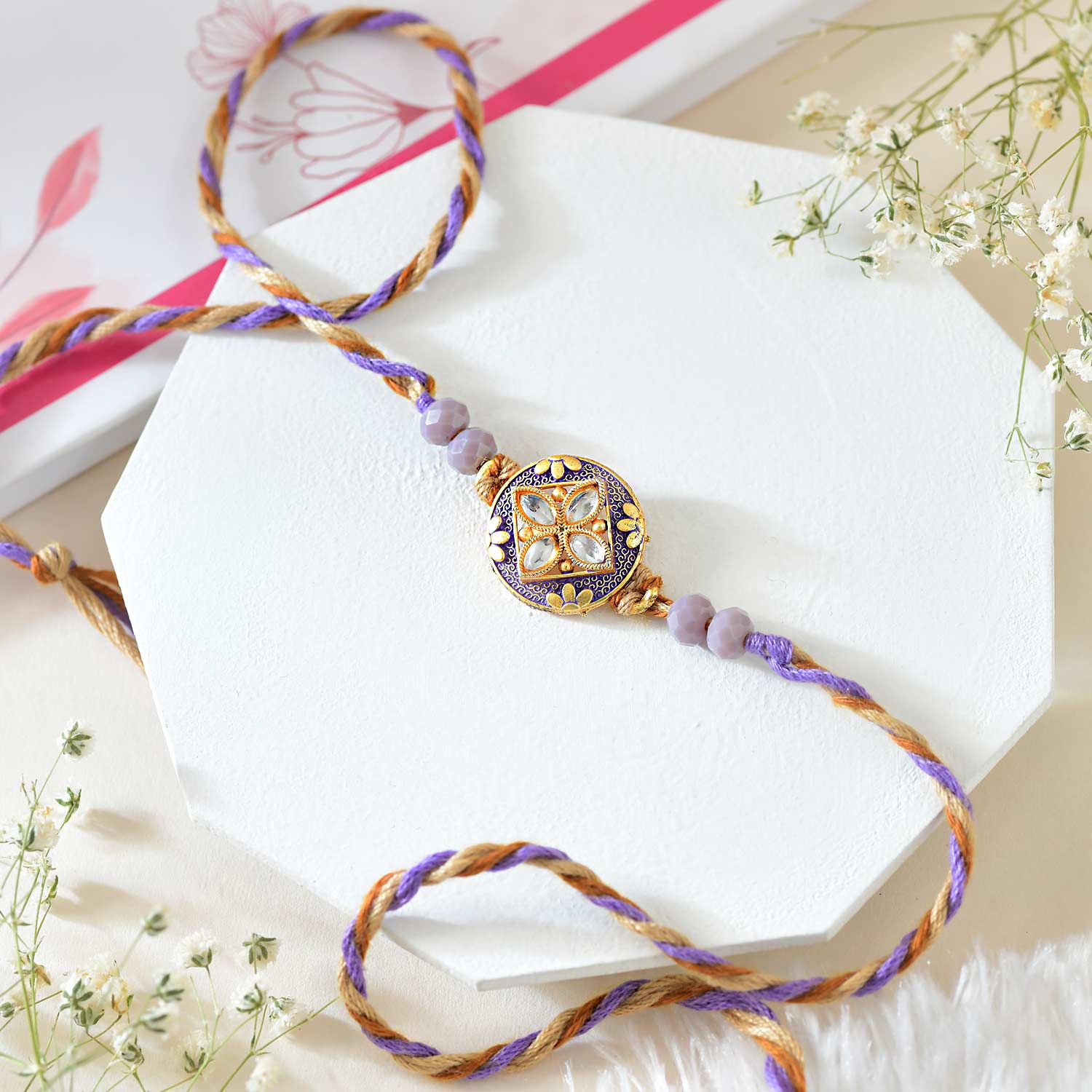 Designer Purple Rakhi With Dry Fruits