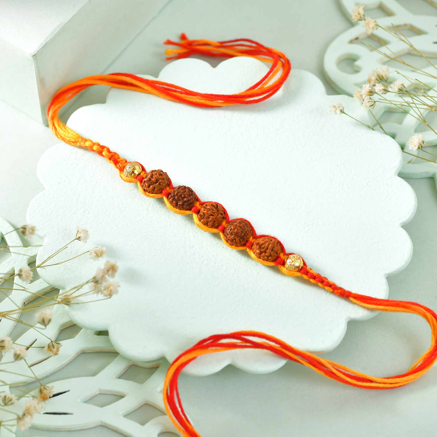 Saffron Rudraksh Rakhi With Ferrero Rochers