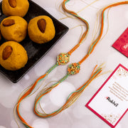 2 Colorful Vibrant Rakhi With Besan Laddu