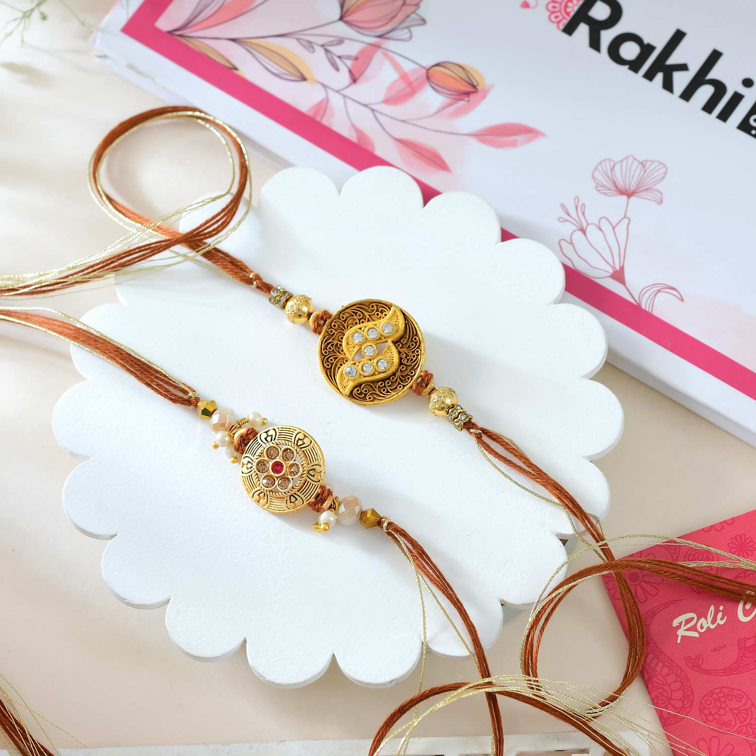 2 Golden Brown Rakhi Set With Dry Fruits
