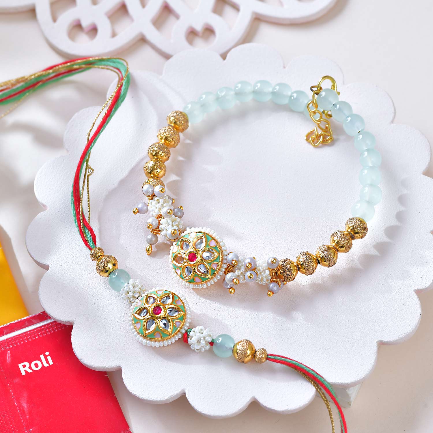 Golden Green Bhaiya Bhabhi Rakhi With Toblerone Chocolates
