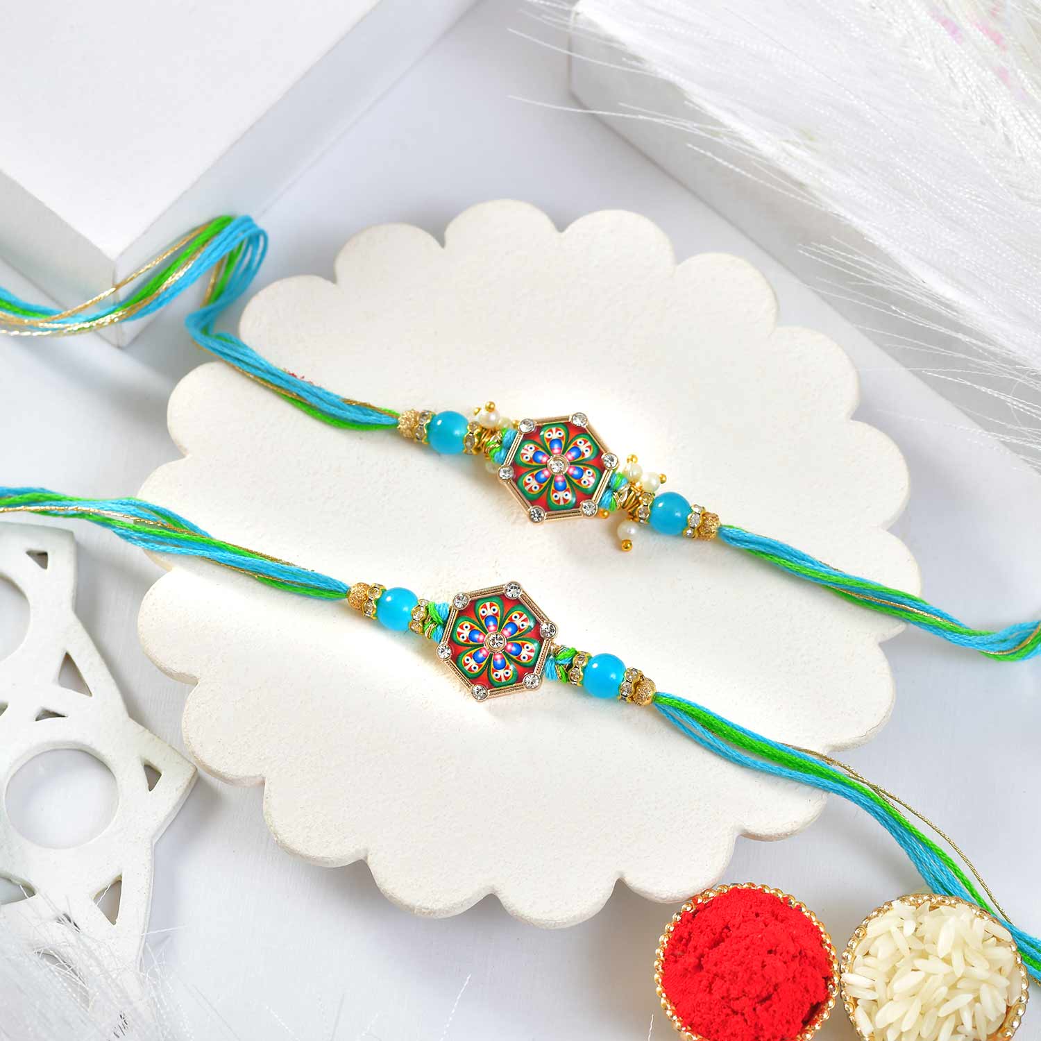 Two Designer Blue Rakhi Mix Choco Hamper