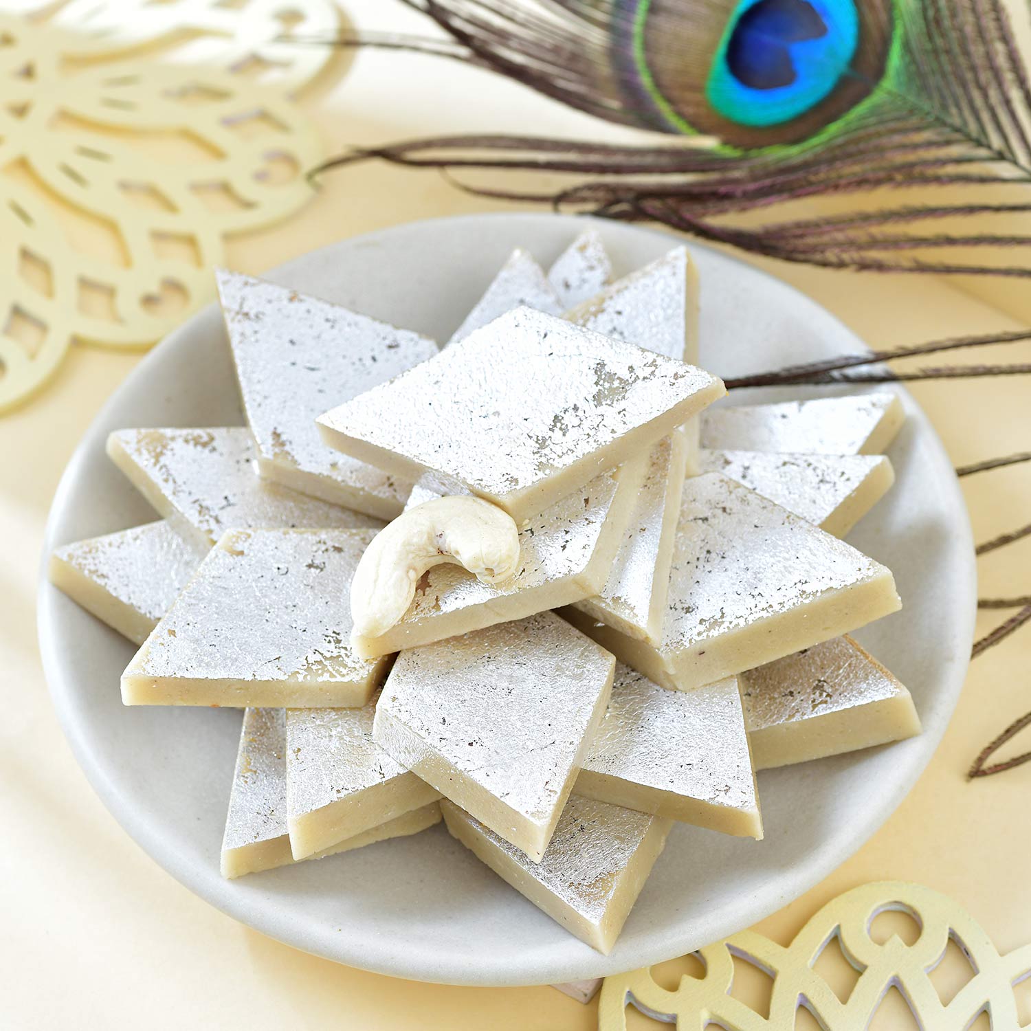 Religious Ganesha And Suriya Dev Rakhi With Kaju Katli
