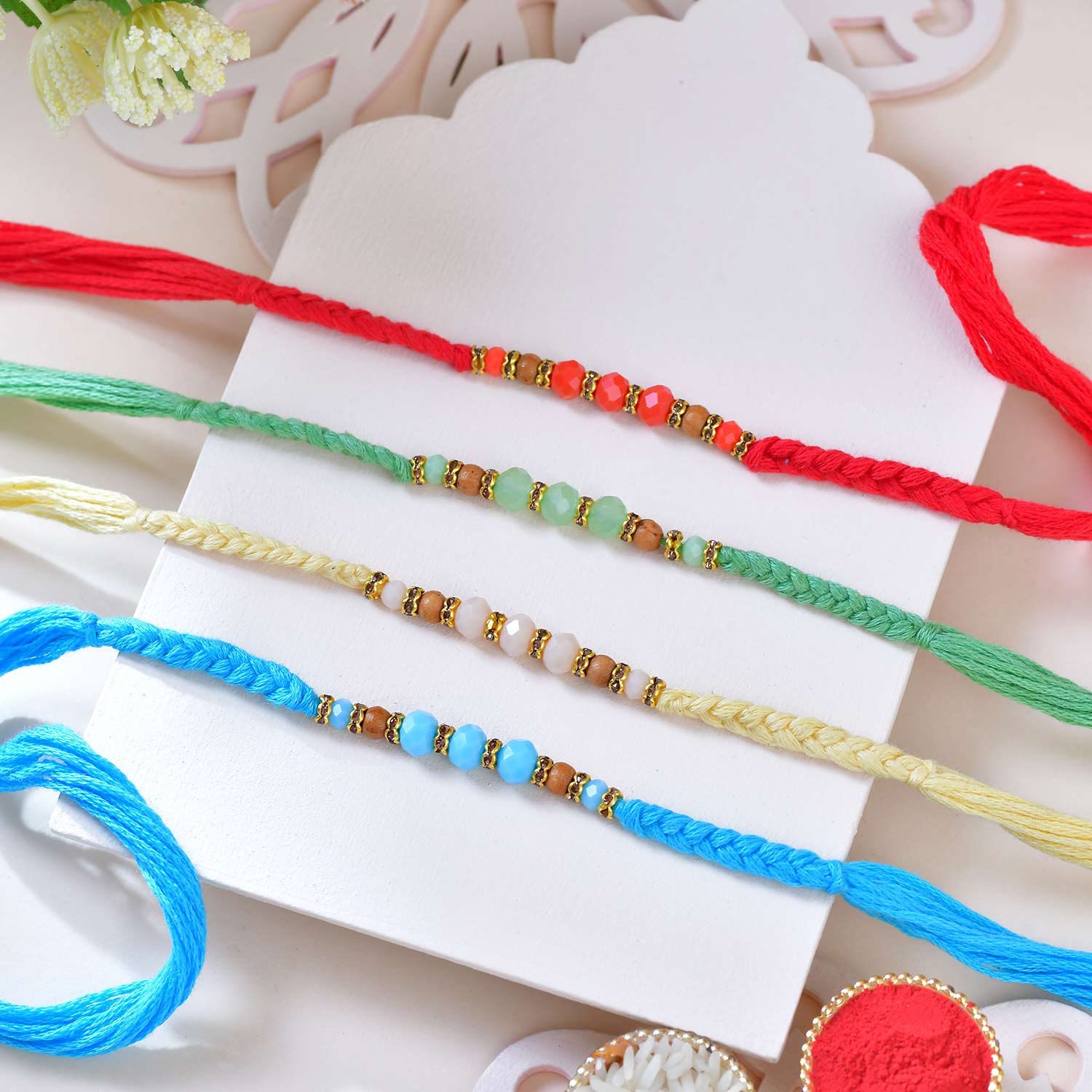 Hand Braided Colorful Rakhi Set With Kaju Katli