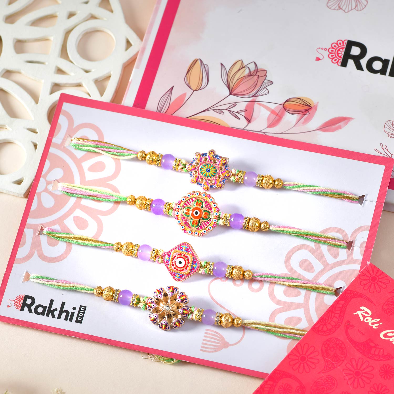 Four Rangoli Rakhi With Kaju Katli